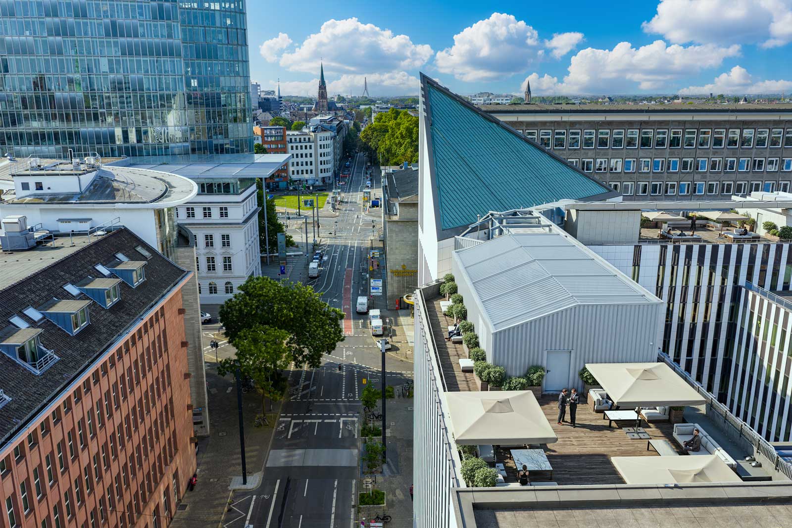 Urban landscape with modern architecture, showcasing a vibrant city view. Crisp lighting enhances 3D visualization and detailed CGI render.